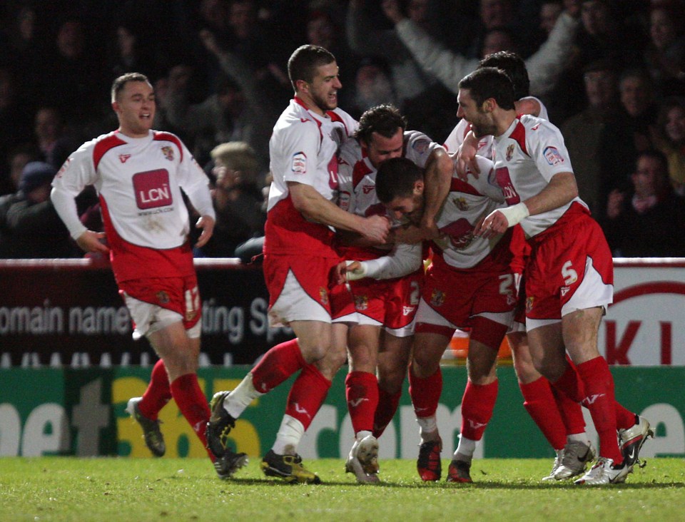 Stevenage players celebrating a goal.