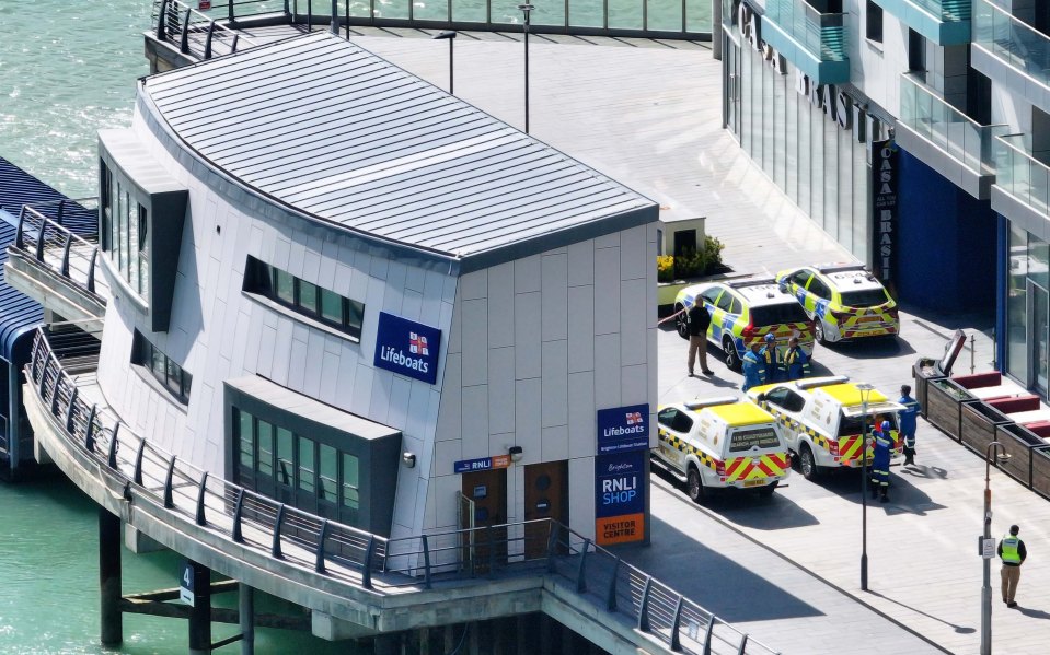 Emergency responders outside an RNLI lifeboat station.