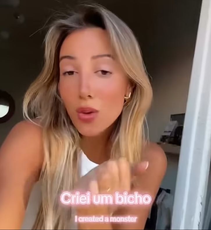 April Ivy in a video, saying "I created a monster" in English and Portuguese.