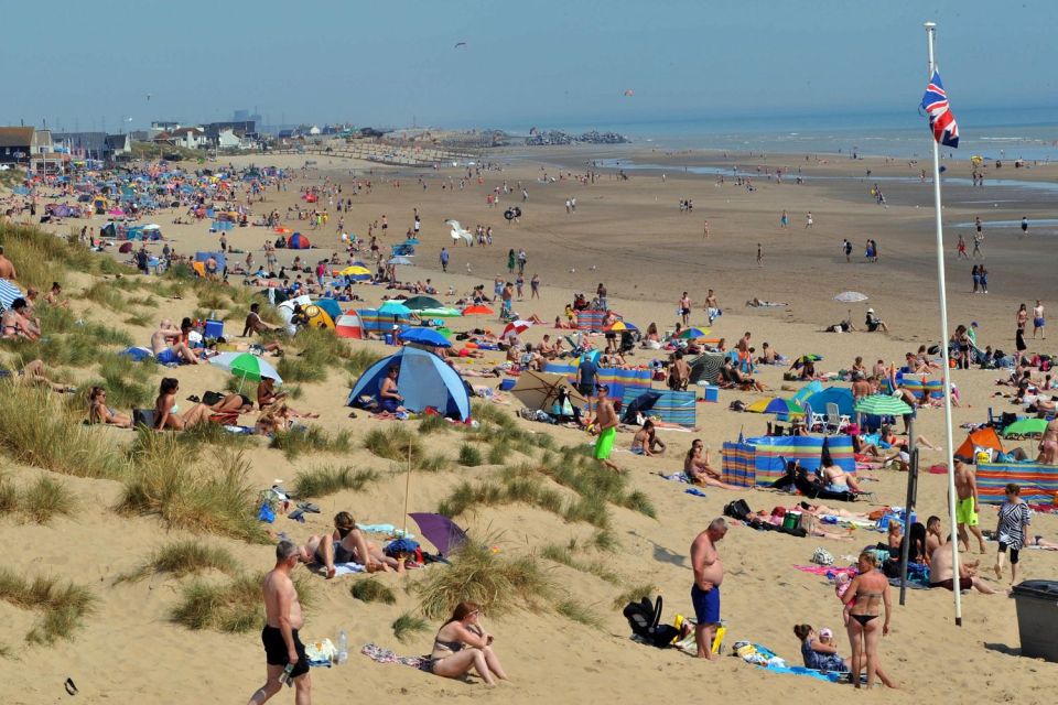 Packed Camber Sands on the hottest day of the year so far 