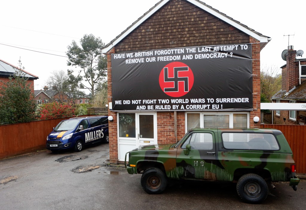 Mr Miller said the 'sign is shown in a historical context referring to nothing other than freedom of democracy'