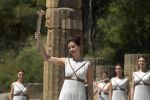 Katerina Lehou with the Olympic flame