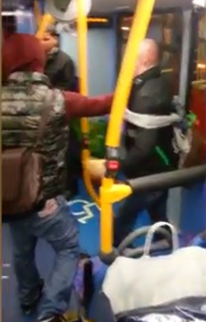 Eventually, he breaks up the fight and the first black passenger leaves the bus