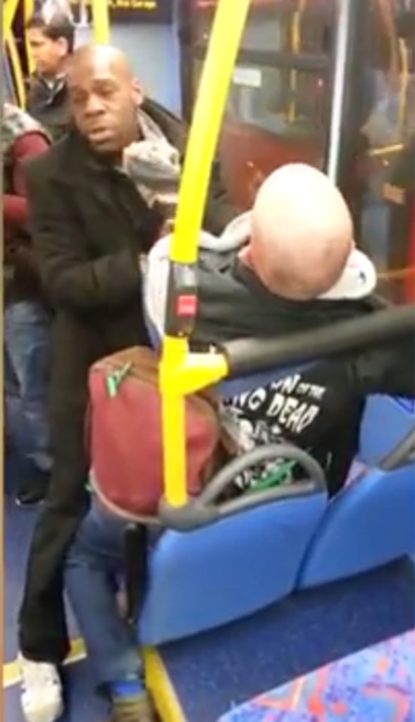 He eventually gets up and the two passengers throttle each other's throats