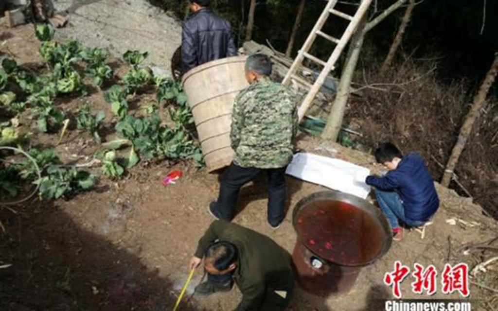 The woman was placed in the barrel which was hanging above a boiling pot of water