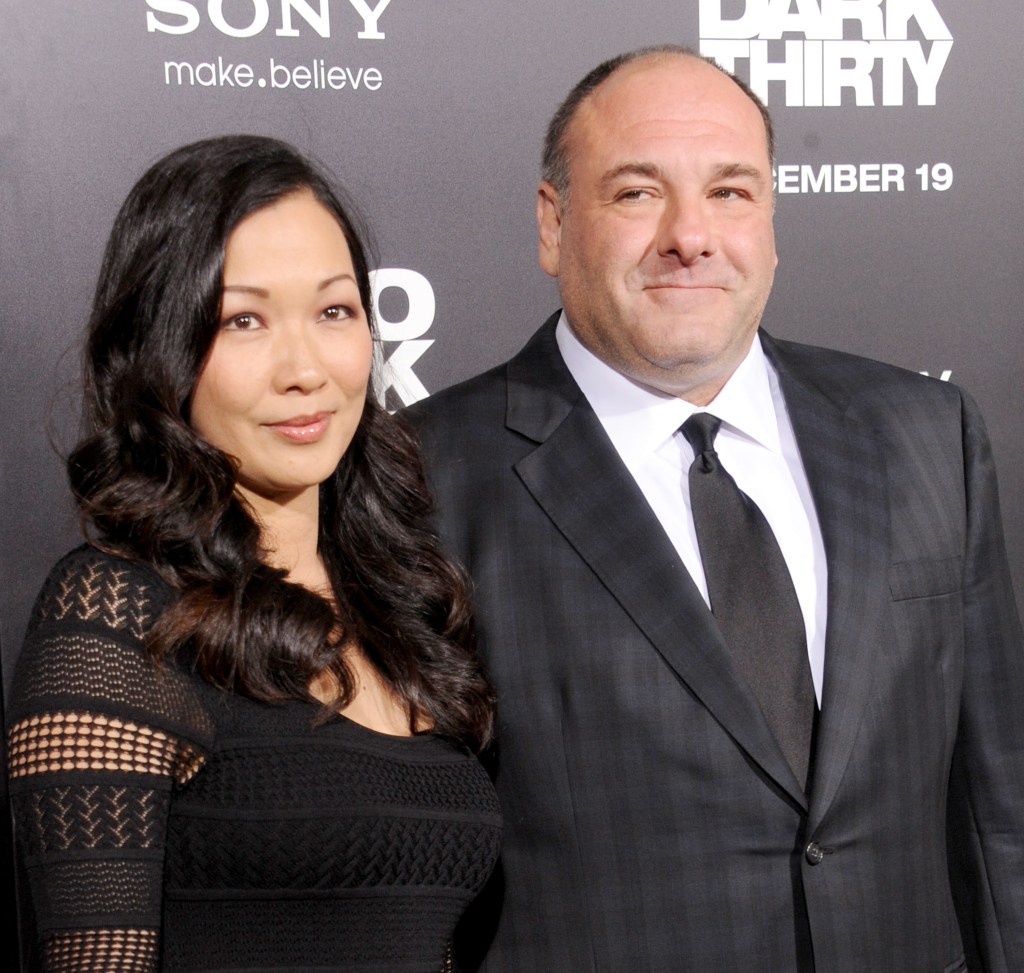 The famous actor collapsed in his Rome hotel suite while on holiday with his wife Deborah Lin (left)