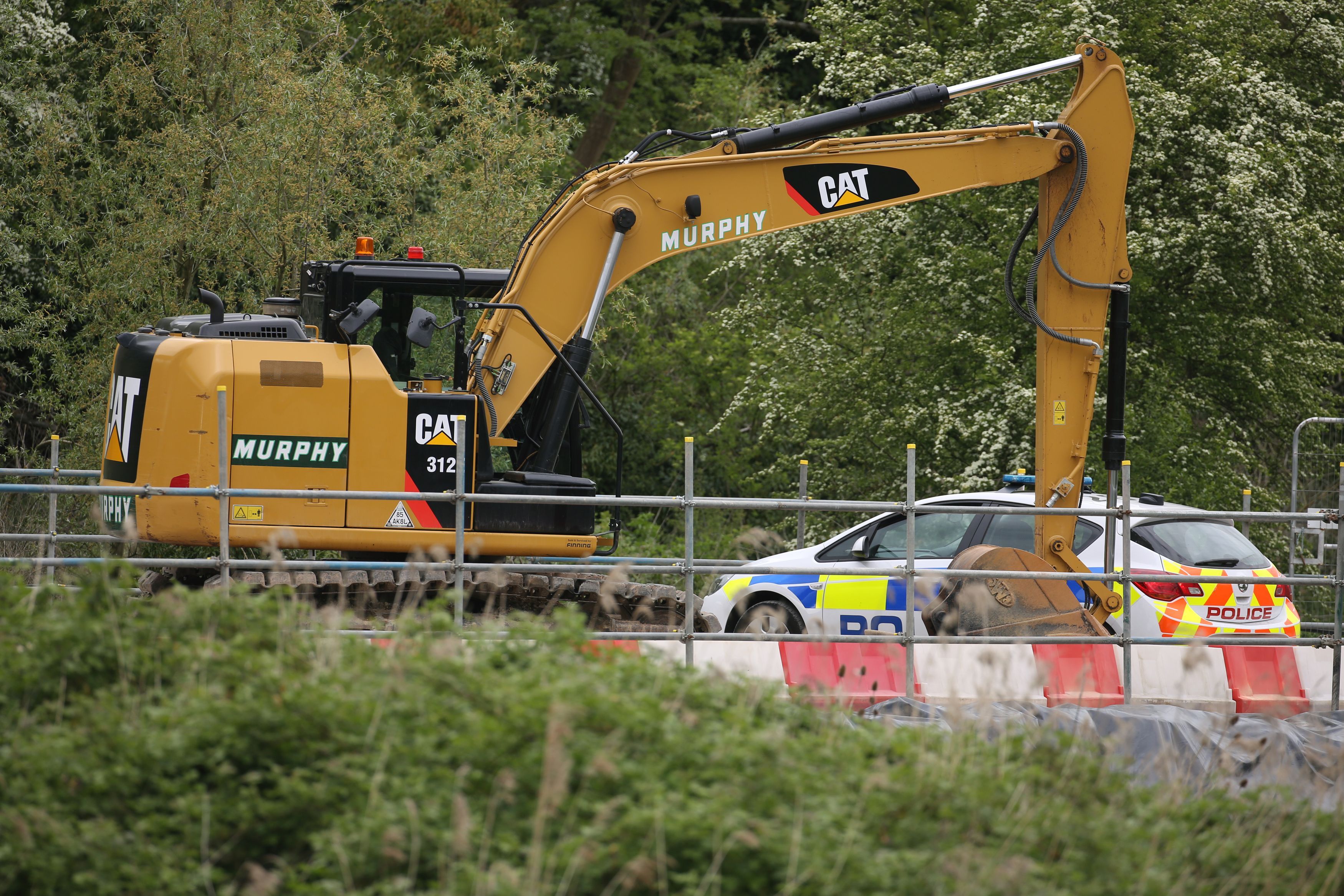 A SEVERED head found in a quarry on Monday does not belong to a missing mum-of-three, a post-mortem revealed