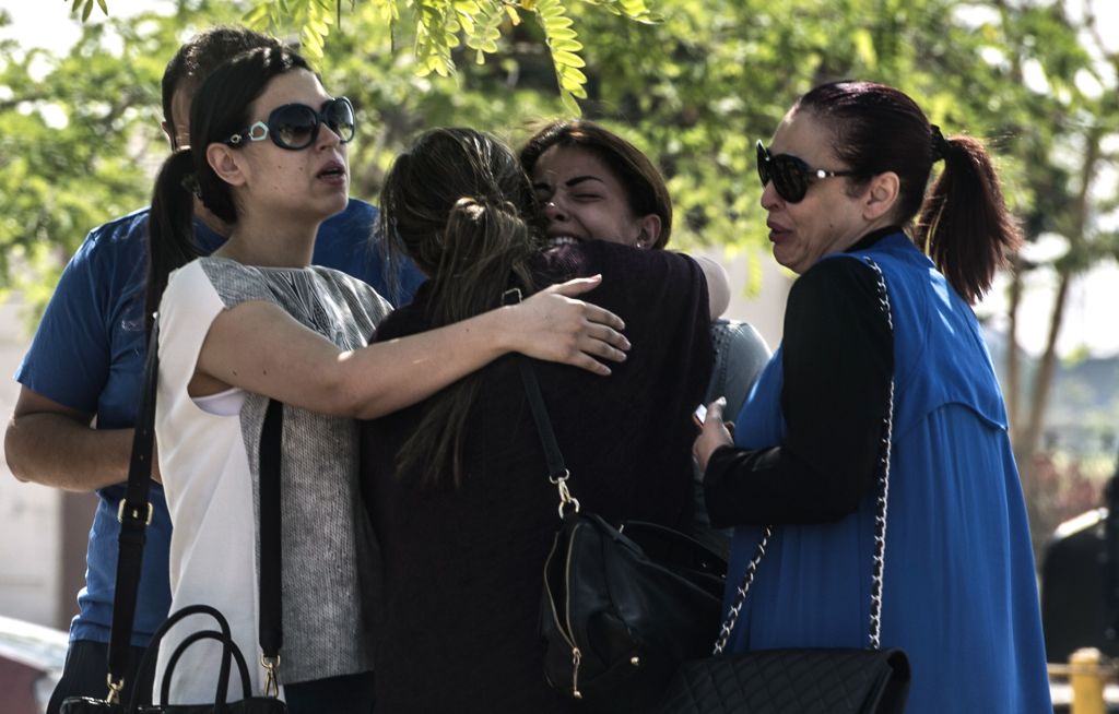 Relatives of missing EgyptAir flight MS804 passengers leave the airliner's center at Cairo Airport, in Cairo