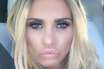 Katie Price prefers to pout and not smile