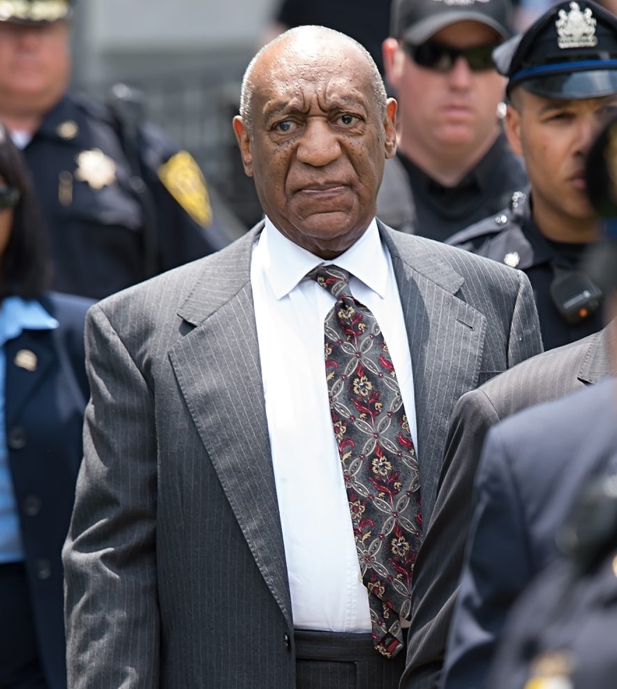 Bill Cosby is seen leaving his preliminary hearing after being ordered to stand trial in Norristown, PA.