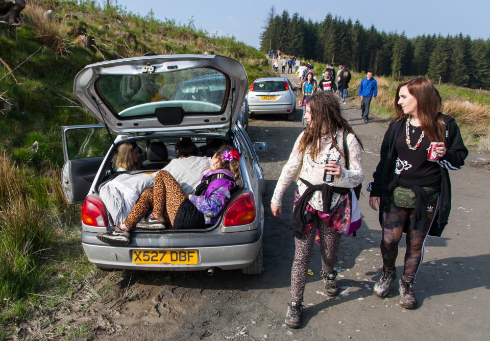 Sleeping it off...up to 2,000 people descended on scenic mid-Wales this bank holiday weekend 