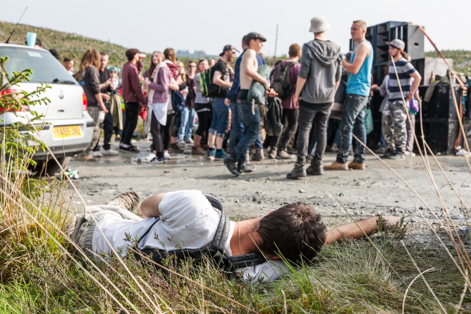 Die-hards...The bank holiday rave in Wales hosted almost 2,000 people with more than a dozen still at the picturesque site three days later 