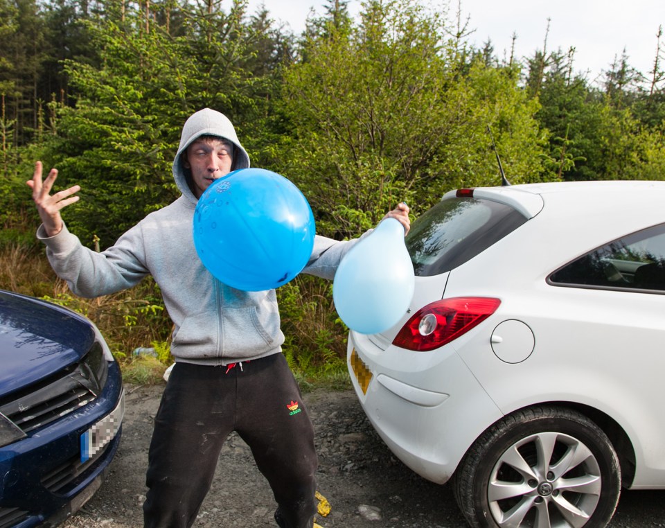 Hooded raver enjoying himself at illegal bank holiday party