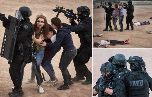Armed police shield football fans from 'Kalashikov killers' in mock terror attack in France ahead of Euro 2016