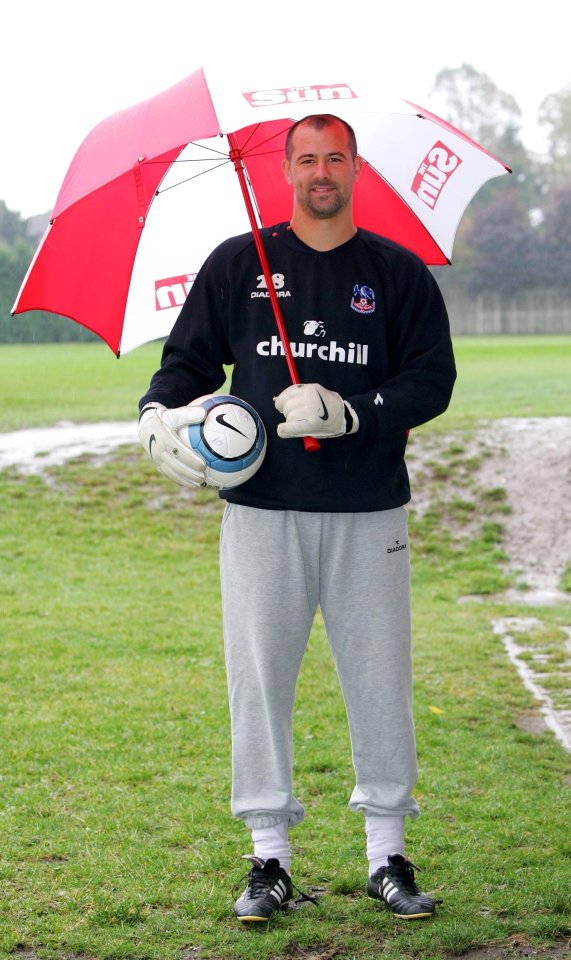 Kiraly poses with his Sun umbrella at Crystal Palace's training ground 