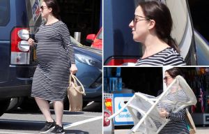 Pregnant actress Natalie Cassidy shows off her bump as she stocks up on essentials before birth