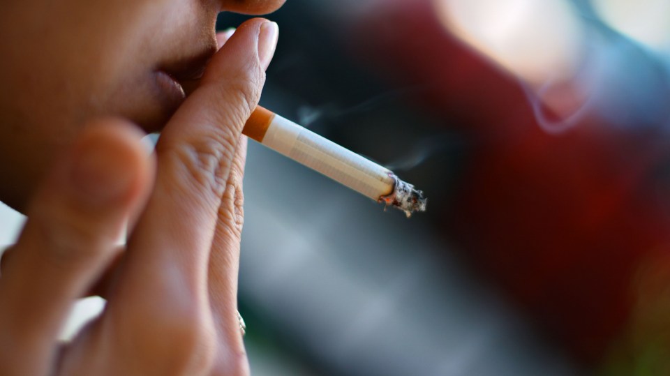 woman smoke smoking cigarette tobacco nicotine inhale exhale consume cunsumption health unhealthy health