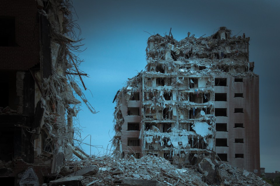 Desolate tower blocks stand empty where families would once have lived side by side