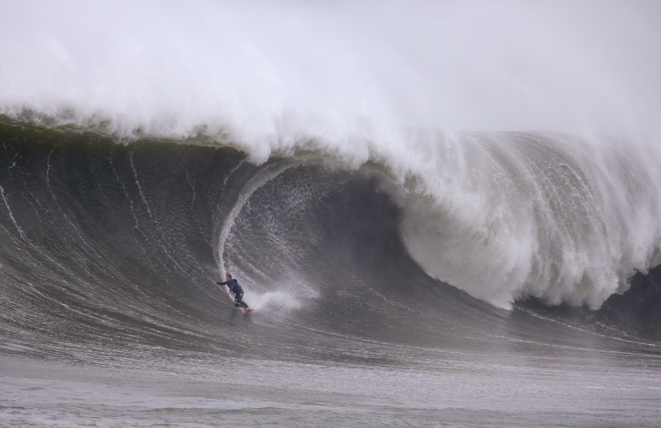 Hardy surfers tried to brave the conditions, but their competition was called off after one daredevil was rushed to hospital when a wave crashed down on him