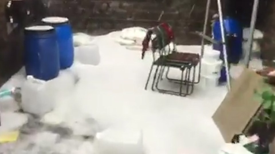 Heavy hailstones accumulated on the ground at the Tan Hill Inn in the Yorkshire Dales this afternoon