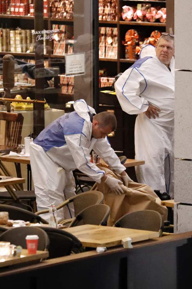 Israeli forensic police inspect a restau