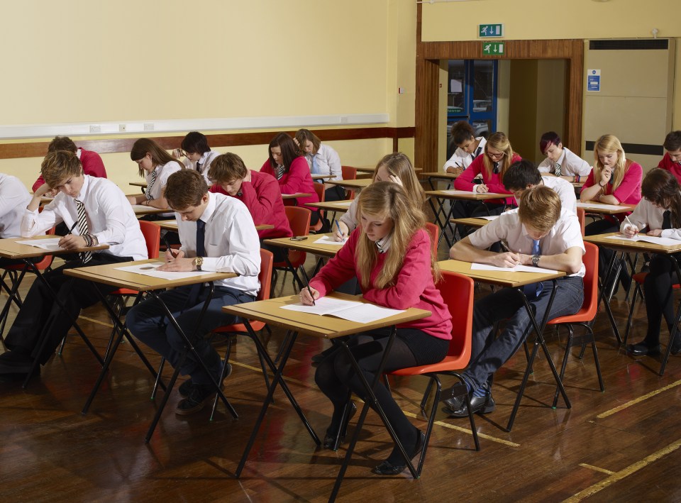 teenagers sitting an exam