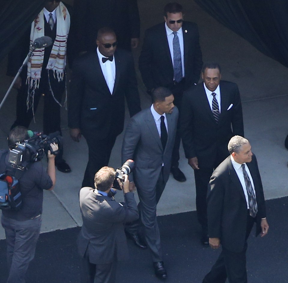 Muhammad Ali Funeral - Pool bearers including Will smith and Lenox Lewis lift Muhammad Ali's coffin into the hearse