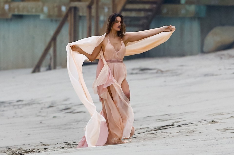 Alessandra makes shapes with the chiffon gown