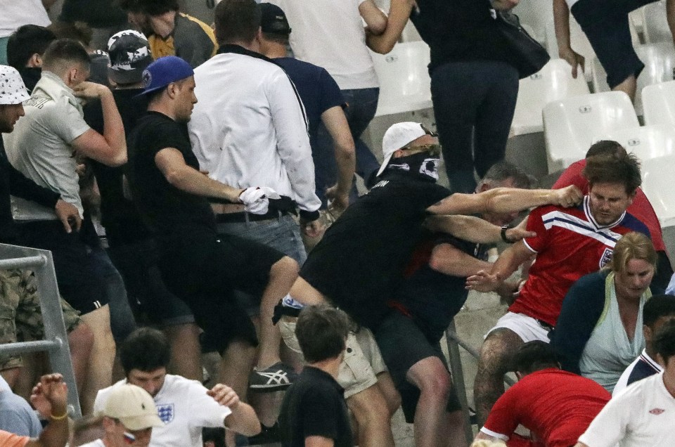 Russia hooligan charge at England supporters at end of Euro