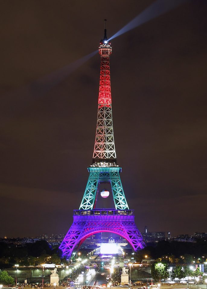 he Eiffel Tower is lit up in the colors of the rainbow flag to pay a tribute for victims of the shooting