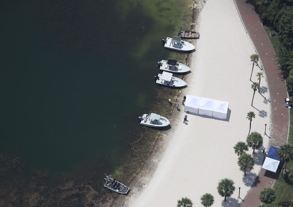 Rescue boats and police vehicles assisted in the desperate search