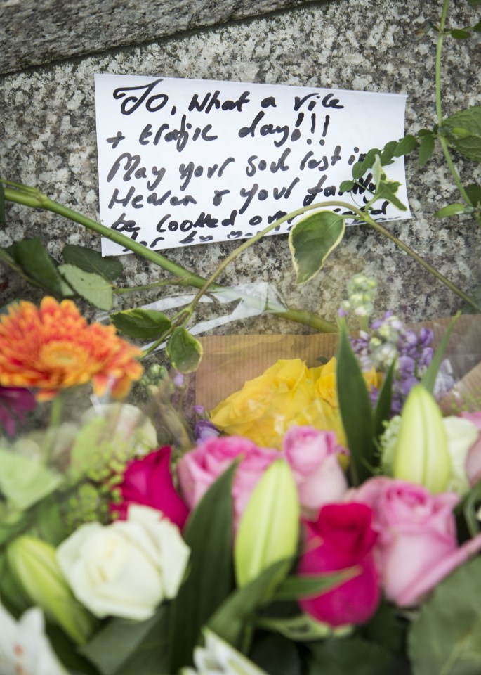 Flowers have been laid at the scene where Labour MP Jo Cox was shot and fatally wounded