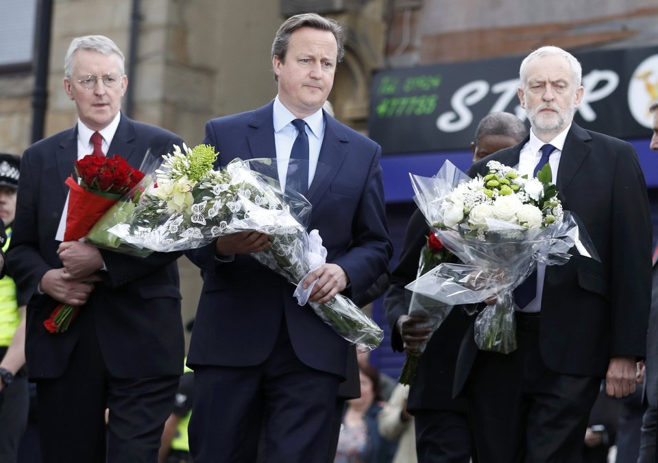 Prime Minister David Cameron leads parliamentarians as they pay respect near the scene where Labour Member of Parliament Jo Cox was killed in Birstall near Leeds