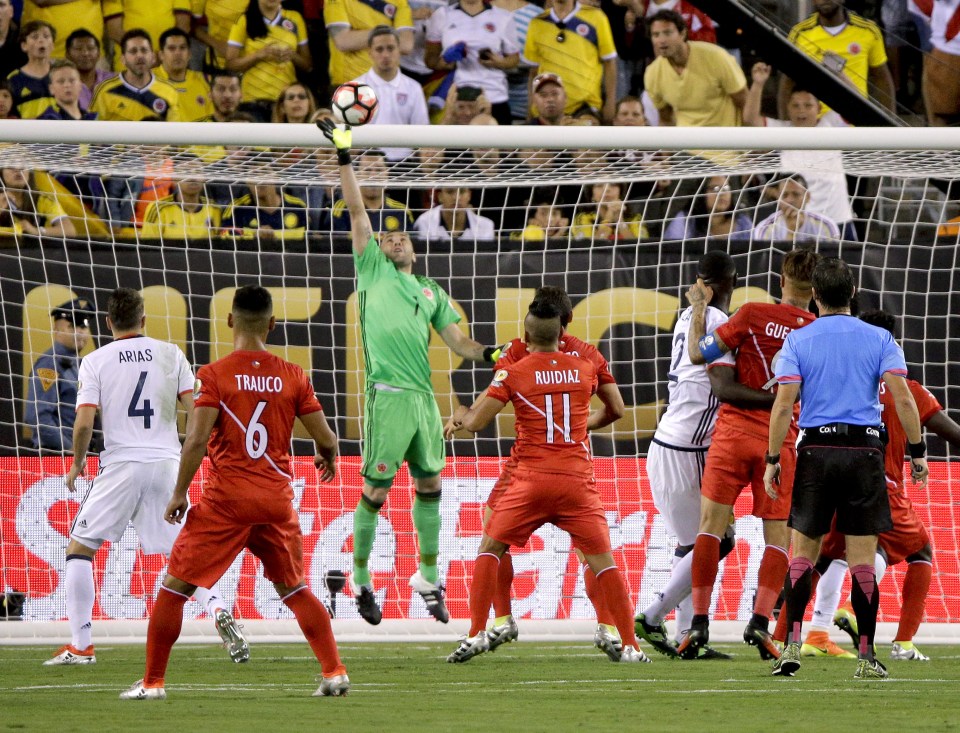 Ospina pulled off a magnificent late save to force penalties