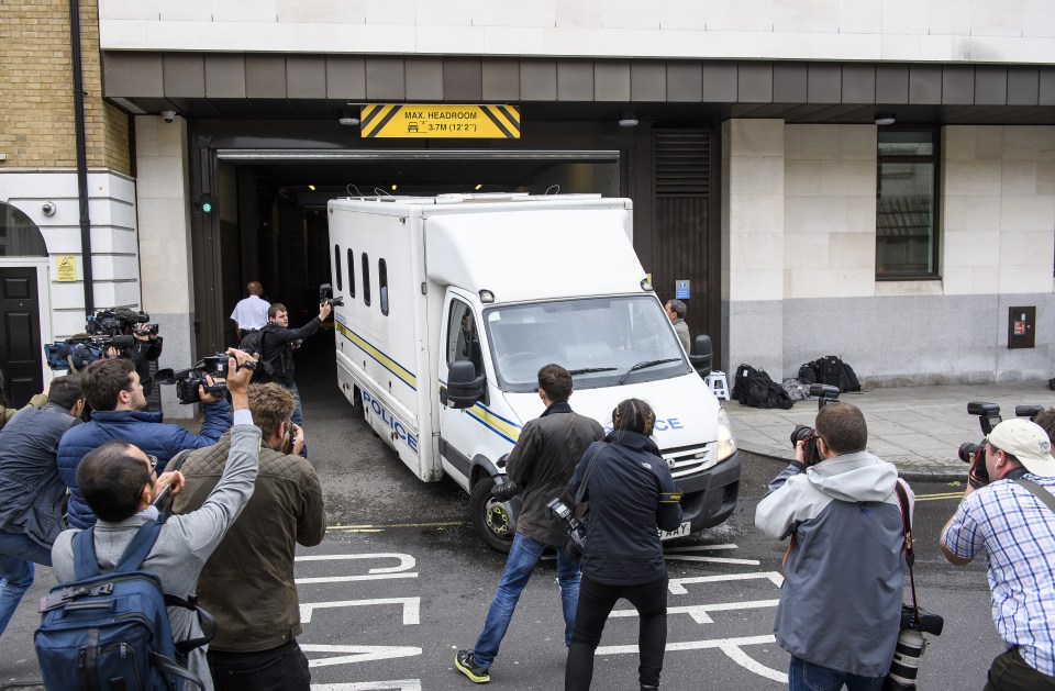 Members of the media tried to catch a glimpse of Mair as he left court in a police van today