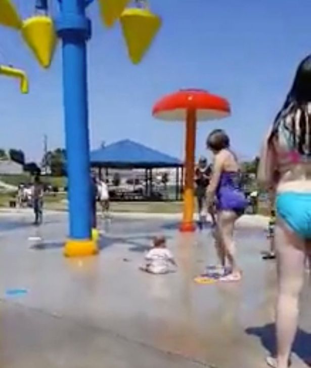 baby drenched in water park