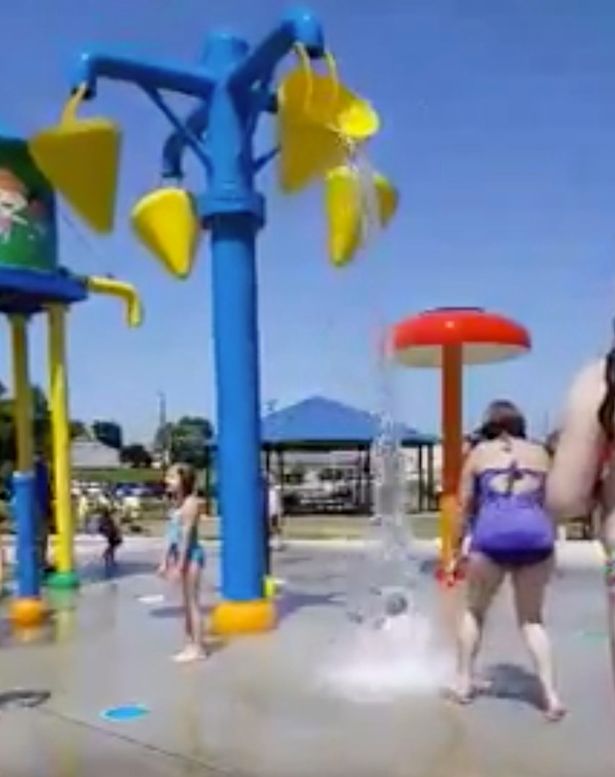 baby drenched in water park 