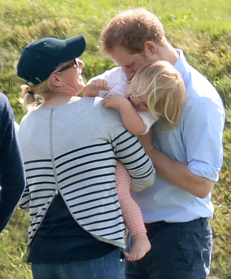 Prince Harry plays with Mia Tindall and mum Zara Tindall