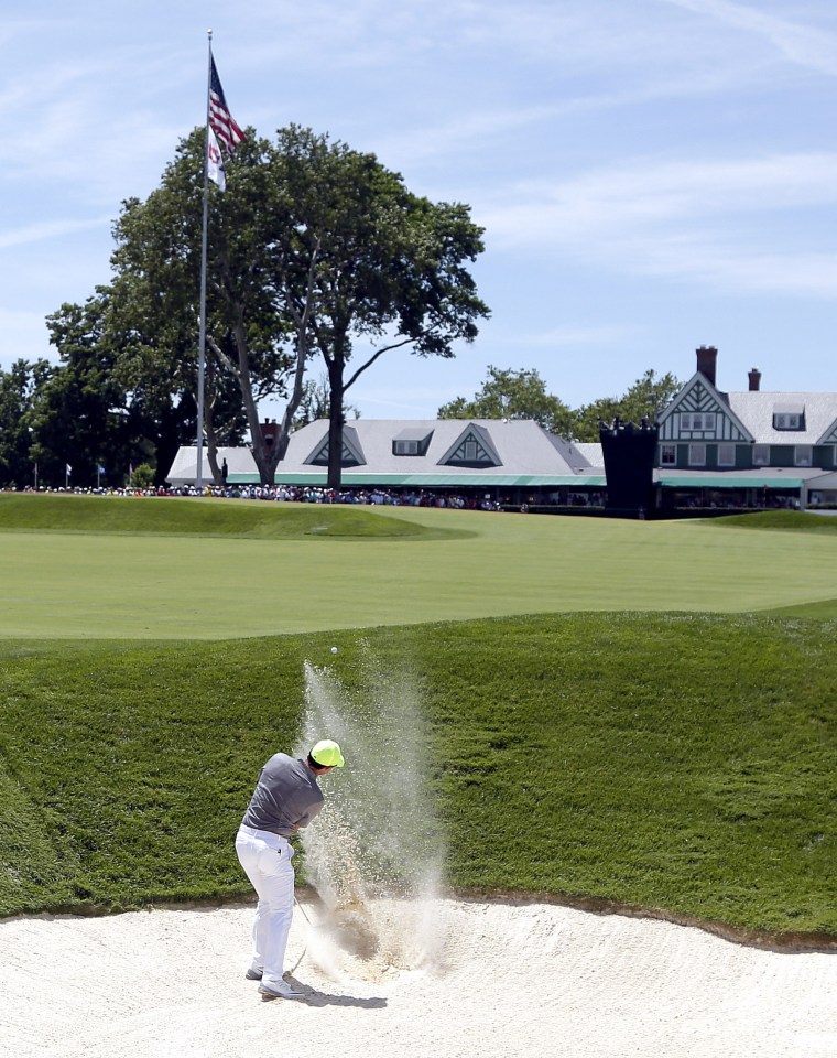 McIlroy found the sand and could only hack his way down the last