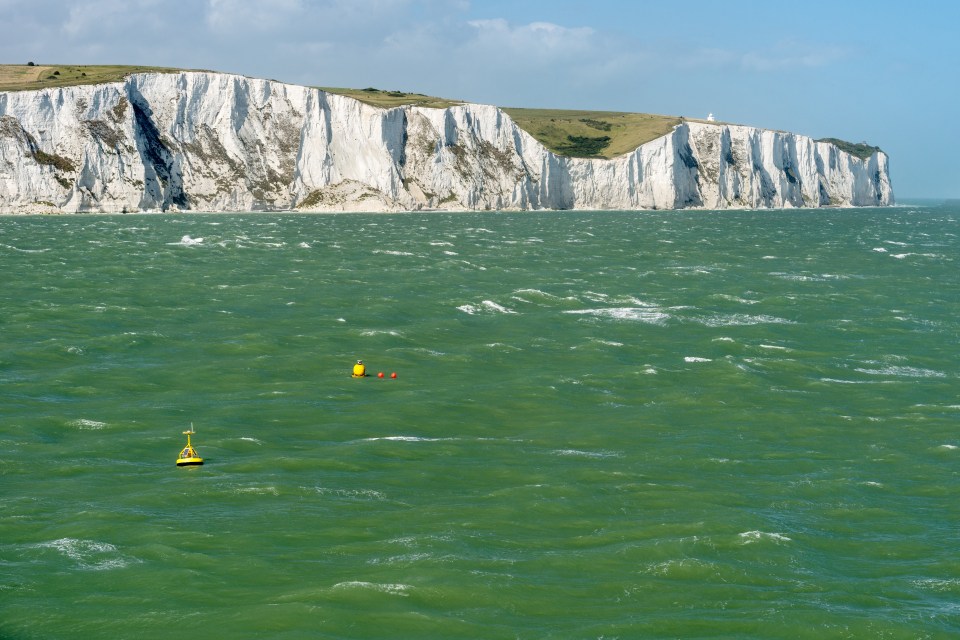 UK, Dover, view from stormy English Channel to chalk cliffs
