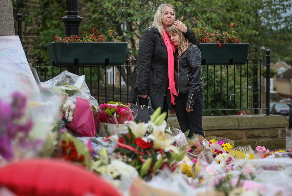 The devastated community have been laying flowers in tribute to the talented MP at the spot where she was killed