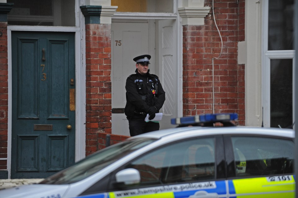 Murder squad detectives stood on guard outside the party house