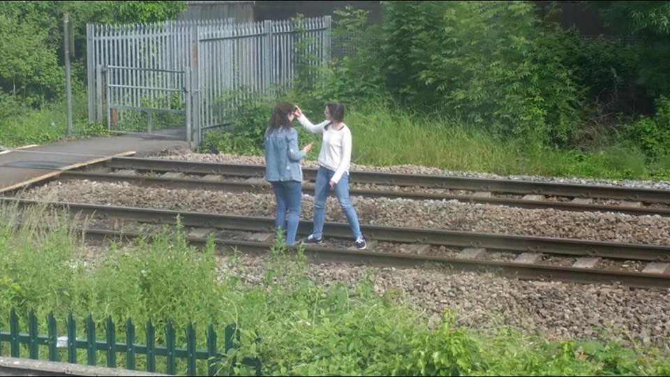 Parents were warned to keep their children off the tracks during the summer holidays after two teenagers were spotted taking selfies on a busy train line in Wales 