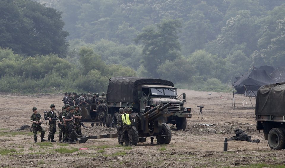 South Korean soldiers participate in formal exercises at a drill field near the demilitarized zone (DMZ) in Paju, Gyeonggi Province, South Korea