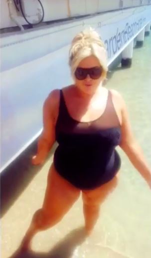 Gemma looks sexy in her black swimsuit 