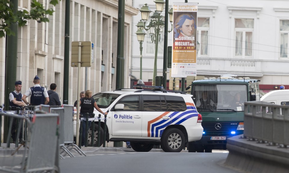 Vans and a police escort arrive for a court hearing for suspect Mohamed Abrini at the Court of Appeals in Brussels on Thursday, June 23, 2016. A Brussels appeals court panel met Thursday to consider France's extradition request for Mohamed Abrini, 31, a suspect in the Paris and Brussels attacks that were claimed by the Islamic State organization. (AP Photo/Virginia Mayo)