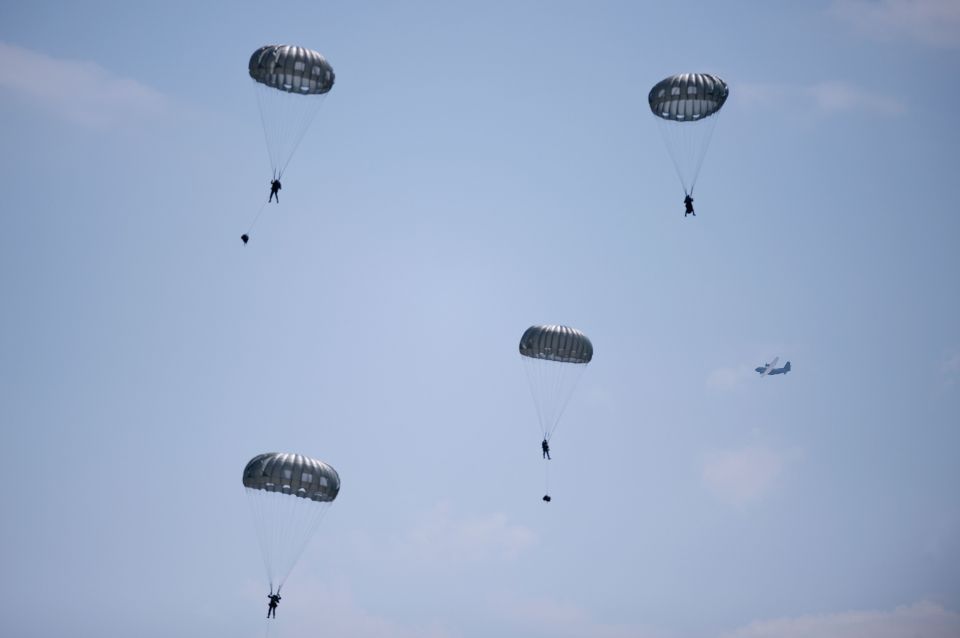 Paratroopers from Bulgaria's special operations force parachute parachute down