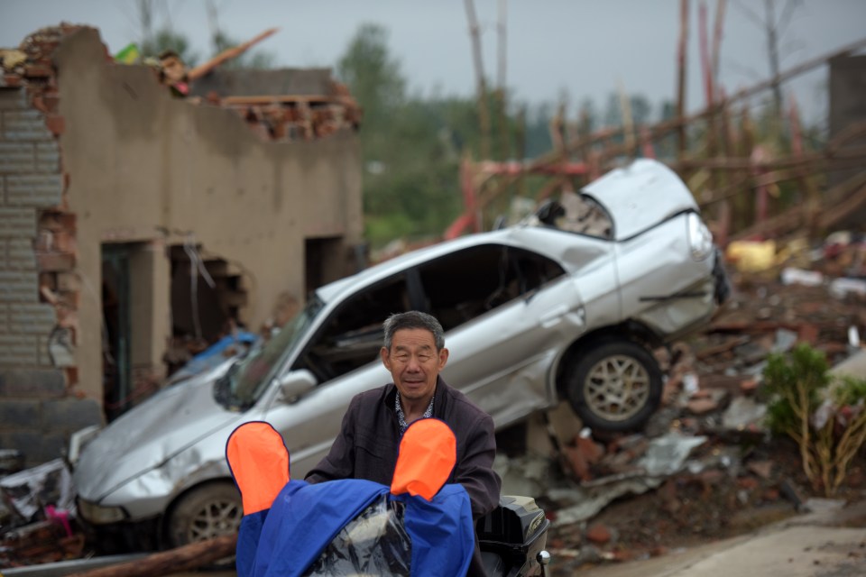 A man broke down in sobs as his 35-year-old son was pulled dead from a pond in Shizhuang town