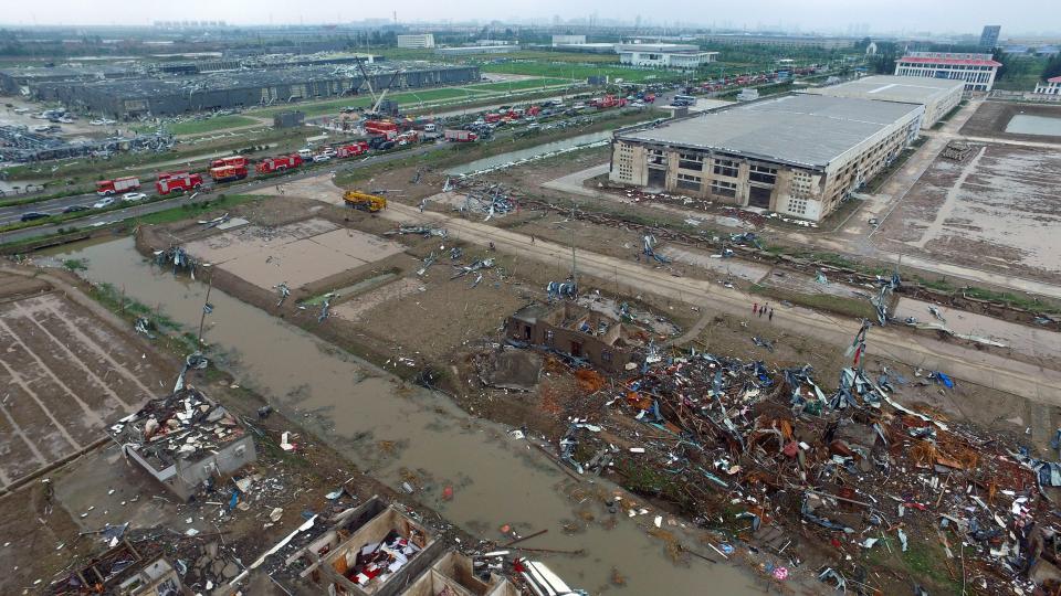 Pictures showed injured people lying amid destroyed houses, overturned cars and split tree trunks