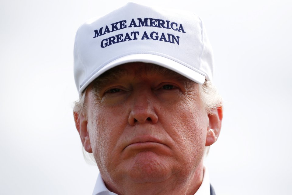 Republican presidential candidate Donald Trump speaks to the media on the golf course at his Trump International Golf Links in Aberdeen